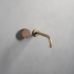 Watermark Elements wood handle and brass faucet.